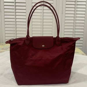Large Longchamp LePliage Neo.  Discontinued model in the color dark wine.